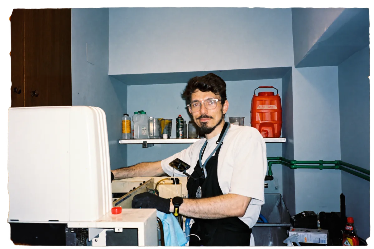 Sasha Yakovlev working in the darkroom lab