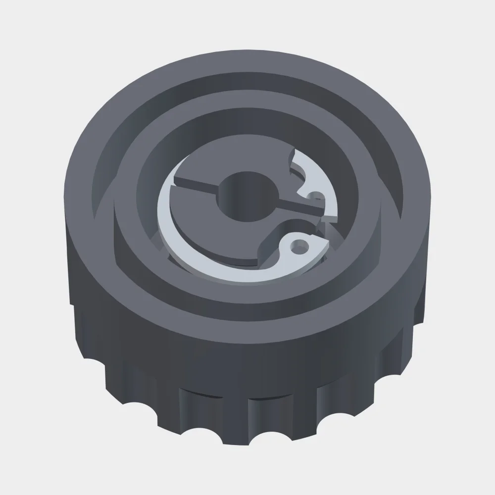 Underside of the knob with the split hub and the DIN 472 circlip in its groove