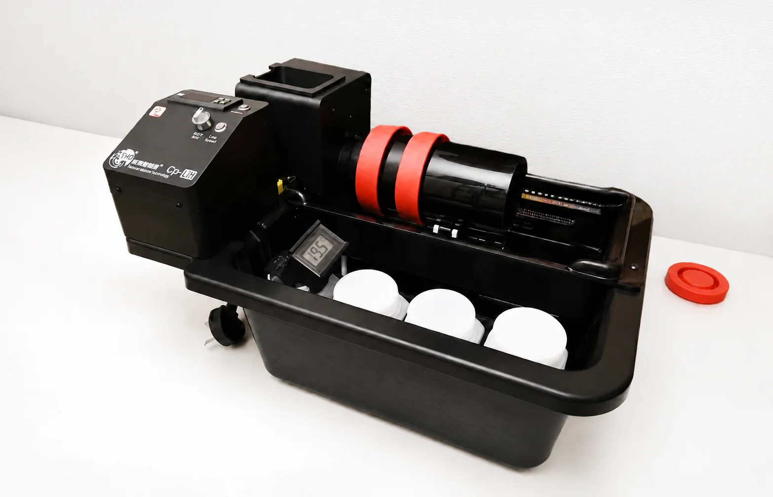 THD Darkroom CP Lift processor on a workbench, showing the control box, water bath, and three processing bottles inside the tank