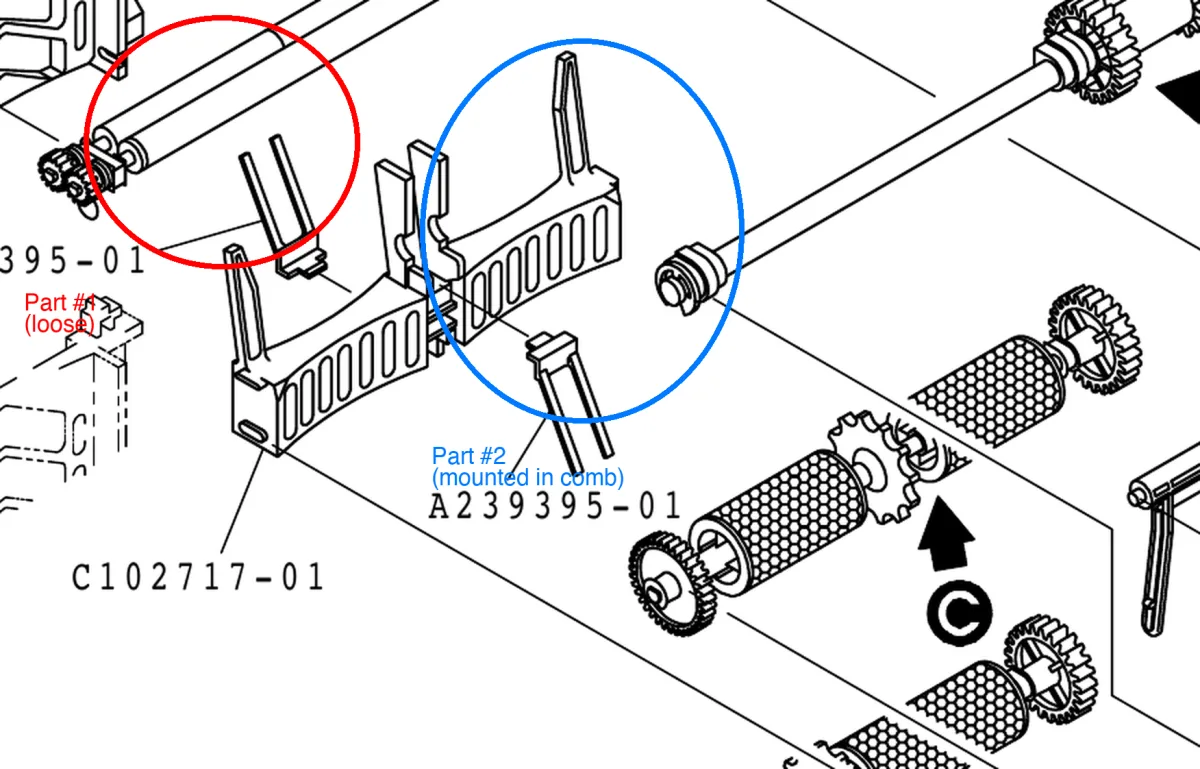 Both GUIDE, FILM (A239395-01) parts, close-up, seated in their plastic comb holder